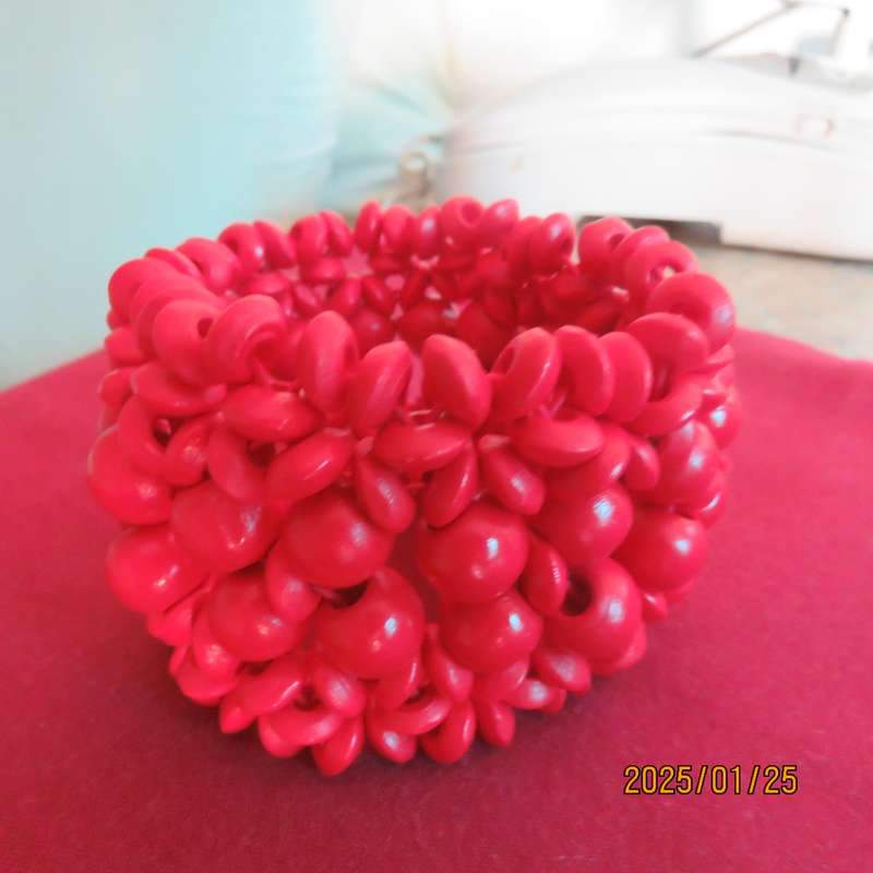 Wide bright red stretch bangle width 5cm. Different size beads. New item
