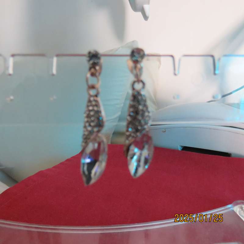 Pair of dainty golden earrings with faux crystal stones and tiny simulated diamonds. New item.