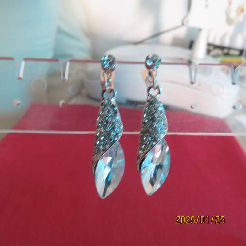 Pair of dainty golden earrings with faux crystal stones and tiny simulated diamonds. New item.