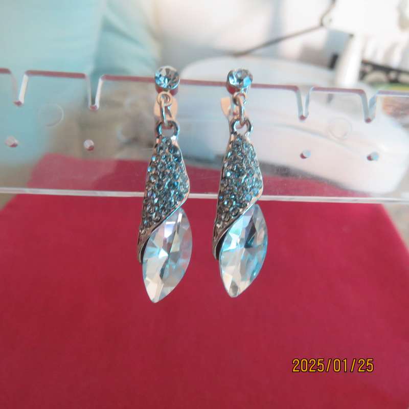 Pair of dainty golden earrings with faux crystal stones and tiny simulated diamonds. New item.