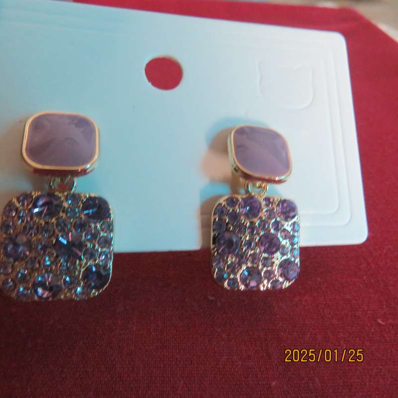 Cute pale violet drop and dangle earrings. Golden with bottom in tiny glimmer stones. New item