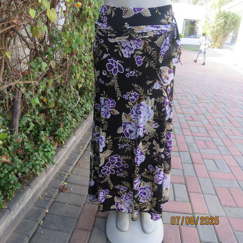 Black sheer stretch polyester maxi skirt with purple-grey roses. Wide bottom. Size 36