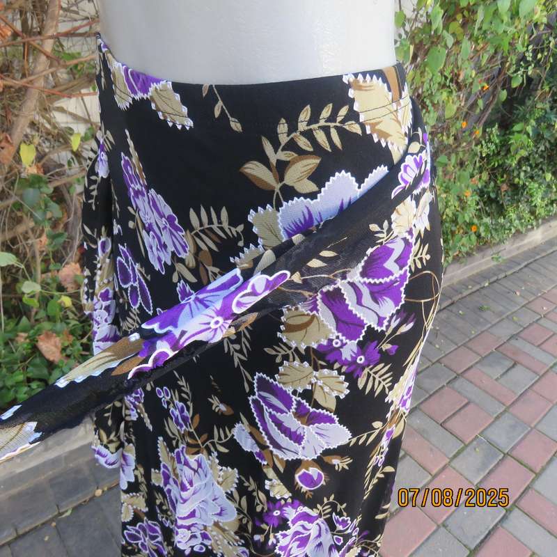 Black sheer stretch polyester maxi skirt with purple-grey roses. Wide bottom. Size 36