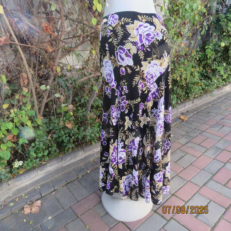 Black sheer stretch polyester maxi skirt with purple-grey roses. Wide bottom. Size 36