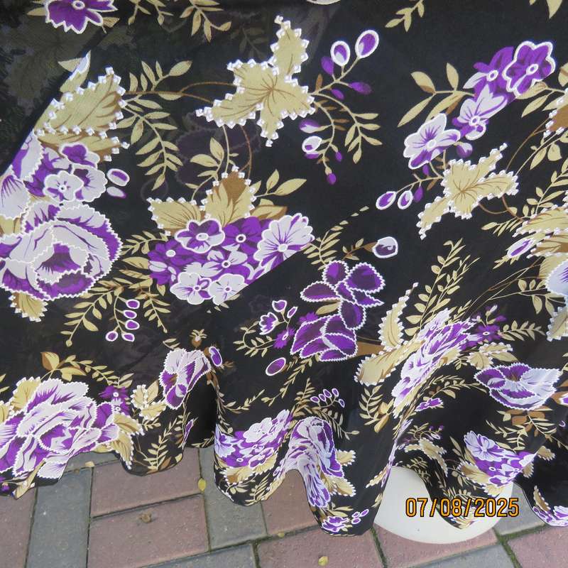 Black sheer stretch polyester maxi skirt with purple-grey roses. Wide bottom. Size 36