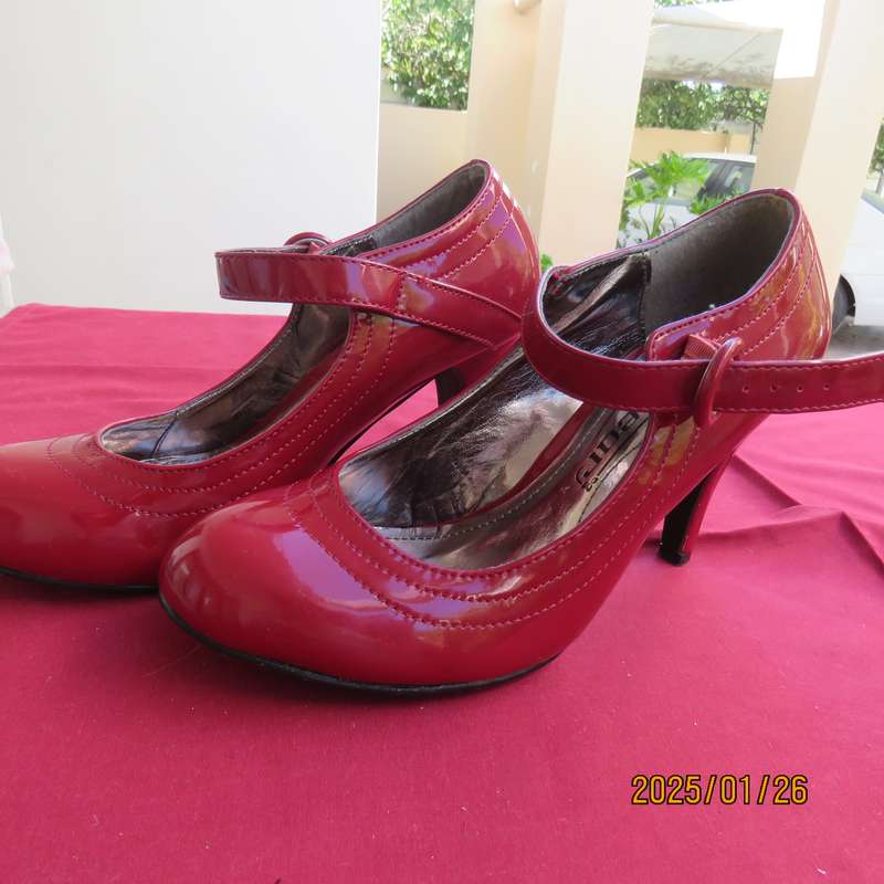 Stunning pair of high heel red patent leather size 4 shoes by INWEAR. As new condition.