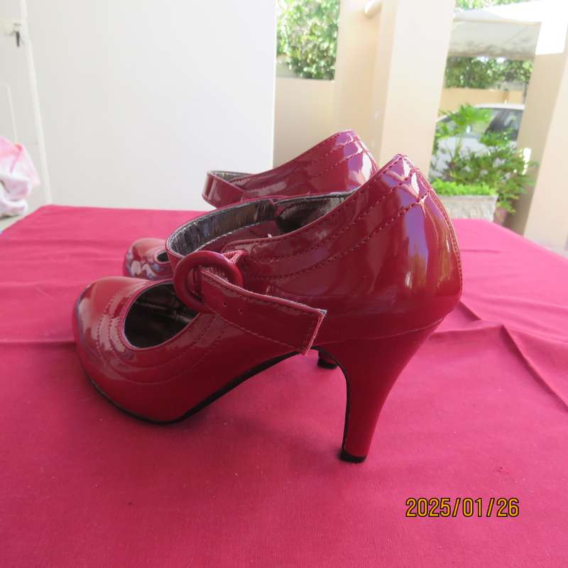 Stunning pair of high heel red patent leather size 4 shoes by INWEAR. As new condition.