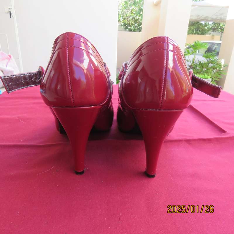 Stunning pair of high heel red patent leather size 4 shoes by INWEAR. As new condition.