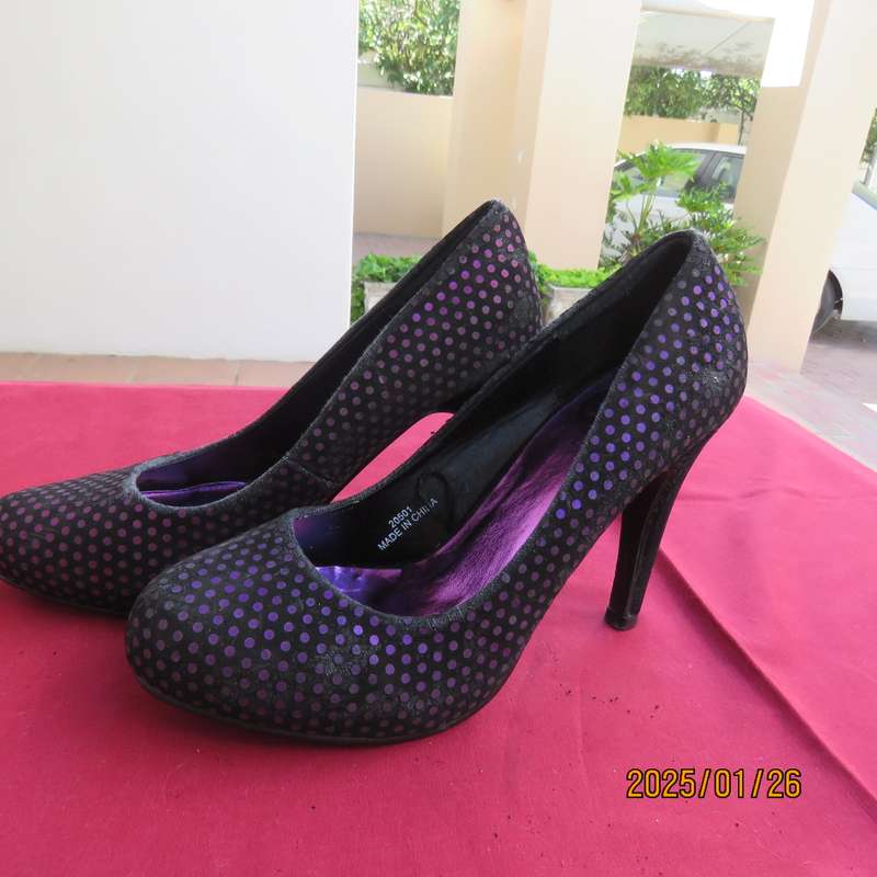Pair black velvety pumps with shiny purple polkadots. Size 4 by Free 2byou. Good condition