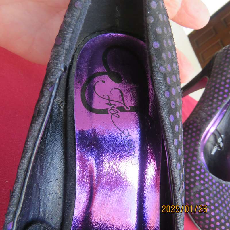 Pair black velvety pumps with shiny purple polkadots. Size 4 by Free 2byou. Good condition