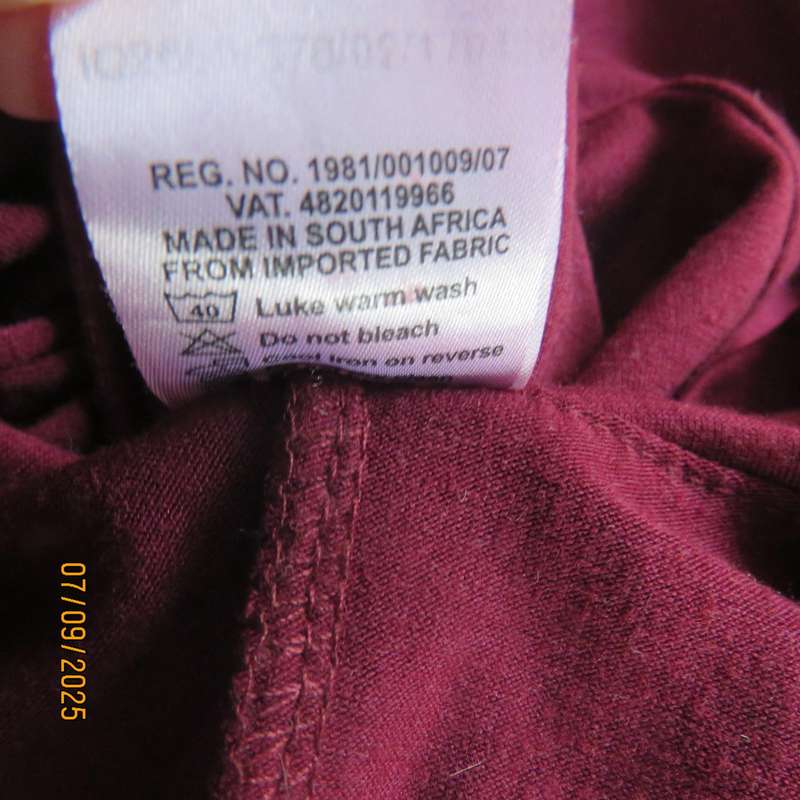 Maroon sleeveless shift dress with wide Bertha collar. Lace hem border. Size 38