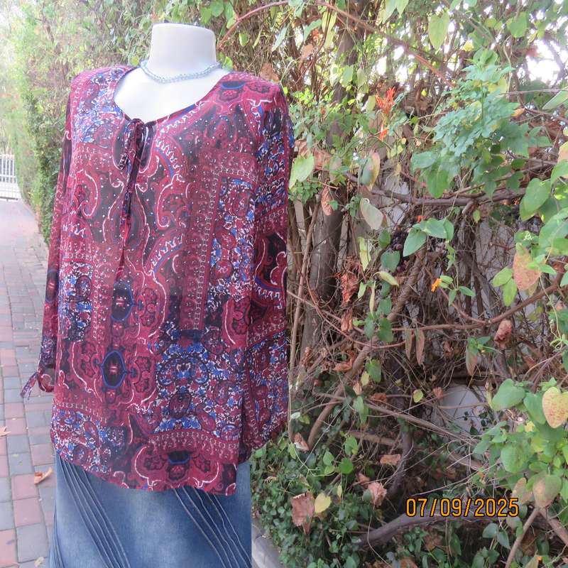 Maroon sheer polyester paisley-floral print in blue-white long sleeve top. Size 42.