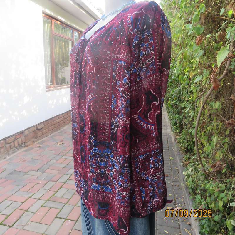 Maroon sheer polyester paisley-floral print in blue-white long sleeve top. Size 42.