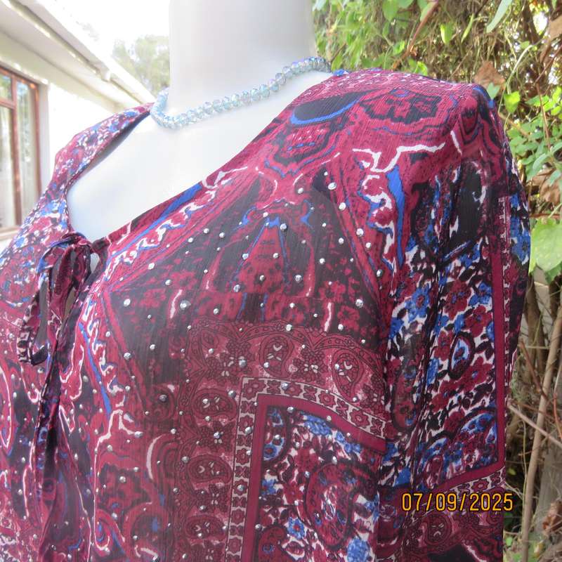 Maroon sheer polyester paisley-floral print in blue-white long sleeve top. Size 42.