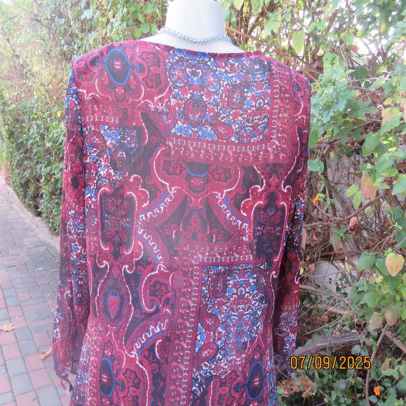Maroon sheer polyester paisley-floral print in blue-white long sleeve top. Size 42.