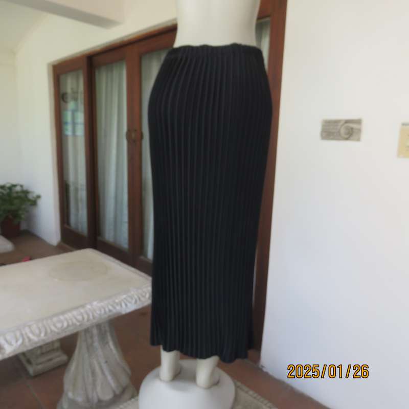 CHARISMA black fine permanent pleated polyester skirt size 36 with elasticated waist. Ankle length