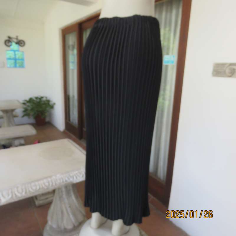 CHARISMA black fine permanent pleated polyester skirt size 36 with elasticated waist. Ankle length