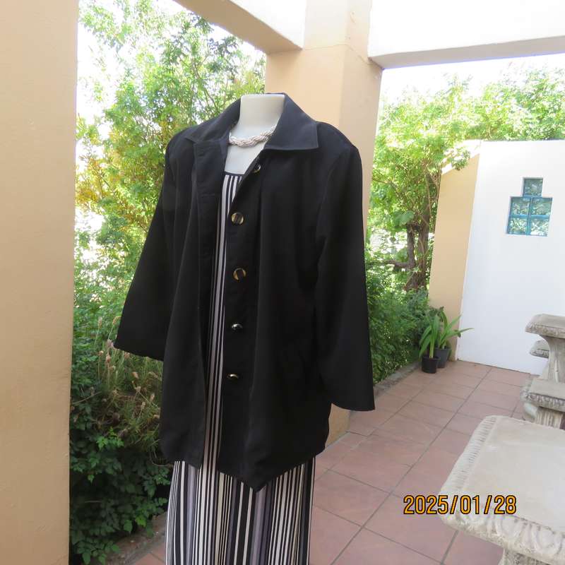 Very black LADY QUEEN long black lined polyester jacket. 5 button closure. Size 42..As new