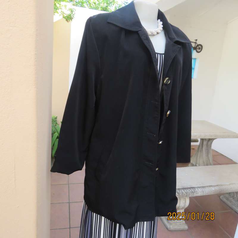 Very black LADY QUEEN long black lined polyester jacket. 5 button closure. Size 42..As new