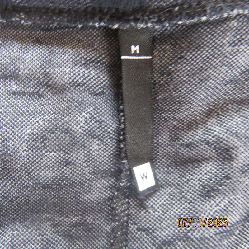 WOOLWORTHS grey-white mottled slip over top with black embossed designs. Size 40
