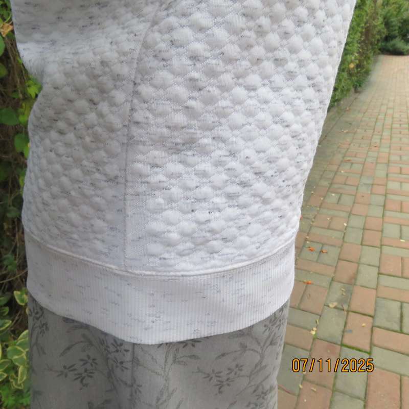 White-grey mottle slightly padded long sleeve slip over top size 38.