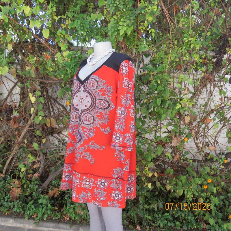 NEWS warm red stretch polyester long top with grey-brown-purple baroque print. Size 42.