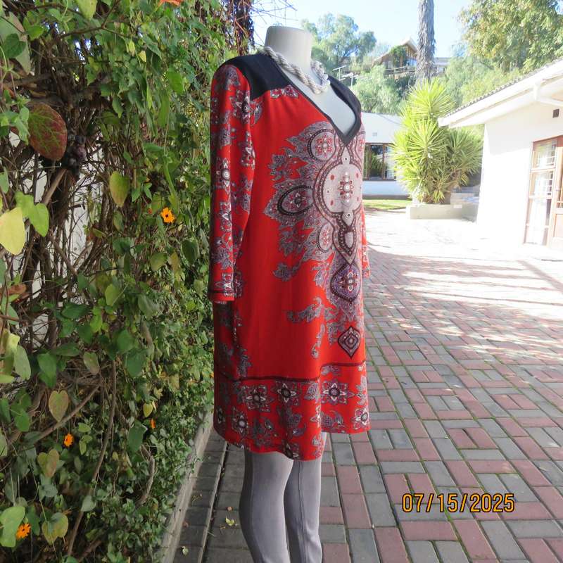 NEWS warm red stretch polyester long top with grey-brown-purple baroque print. Size 42.