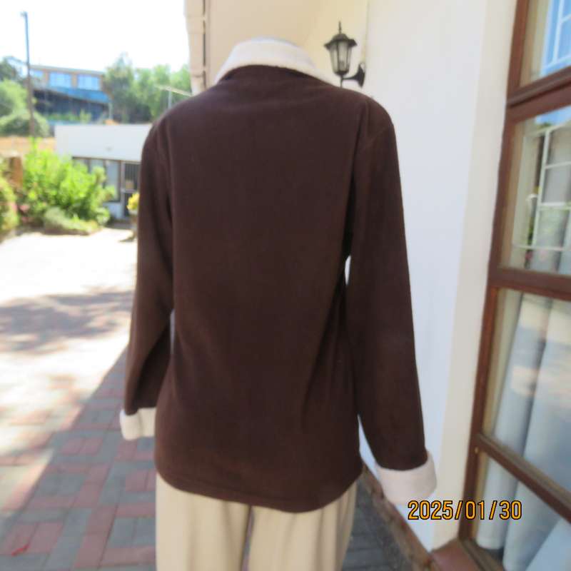 Chocolate brown zip up long sleeve jacket in brushed polyester size 34-36. Cream faux fur collar.