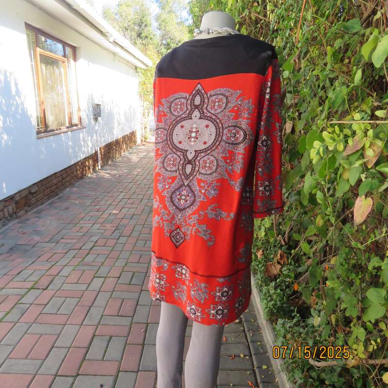 NEWS warm red stretch polyester long top with grey-brown-purple baroque print. Size 42.