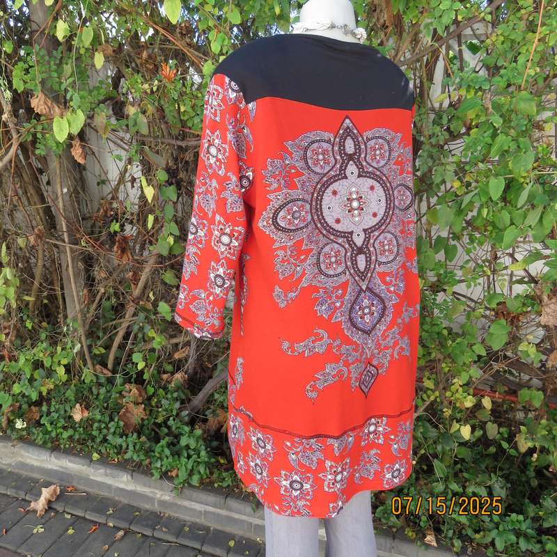 NEWS warm red stretch polyester long top with grey-brown-purple baroque print. Size 42.