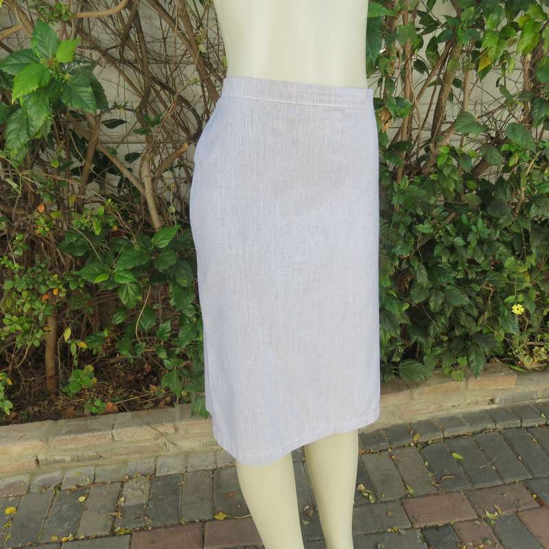 Classic navy/white striped 2 pc pencil skirt and short sleeve top outfit. In polycotton.Size 38.