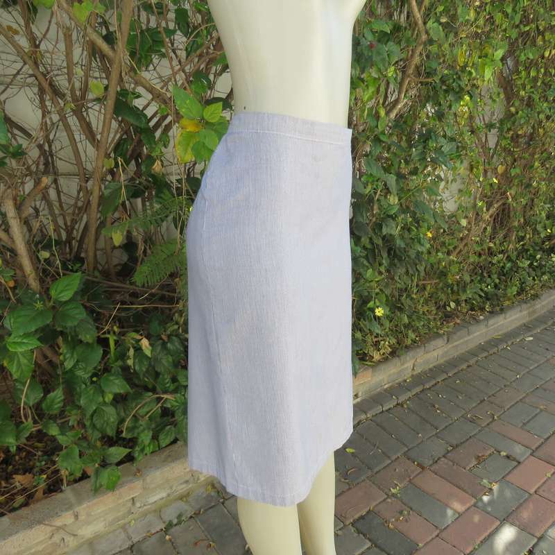 Classic navy/white striped 2 pc pencil skirt and short sleeve top outfit. In polycotton.Size 38.