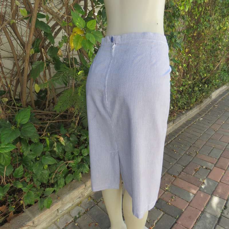 Classic navy/white striped 2 pc pencil skirt and short sleeve top outfit. In polycotton.Size 38.