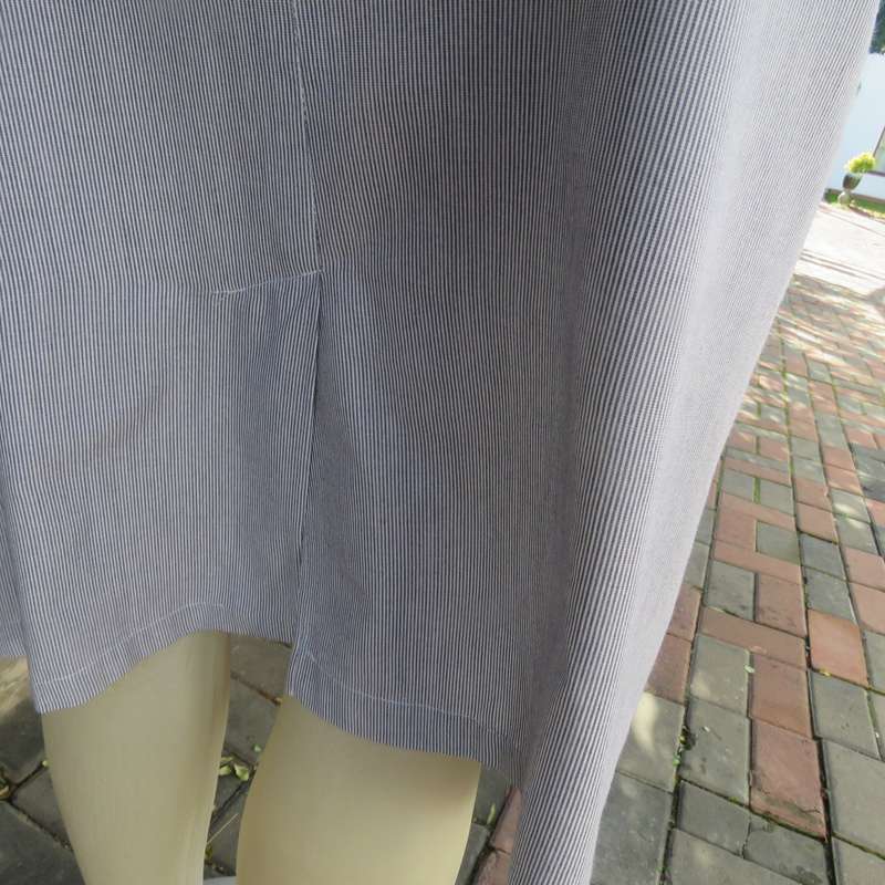Classic navy/white striped 2 pc pencil skirt and short sleeve top outfit. In polycotton.Size 38.