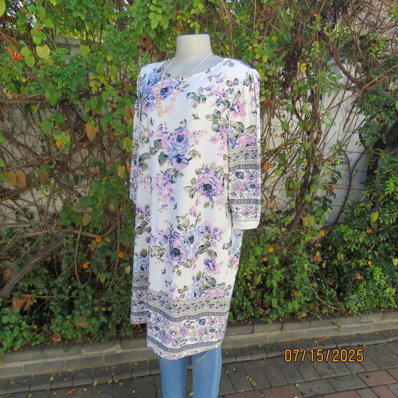 Tasteful pink-blue floral print on white background long stretch polyester top. Size 44
