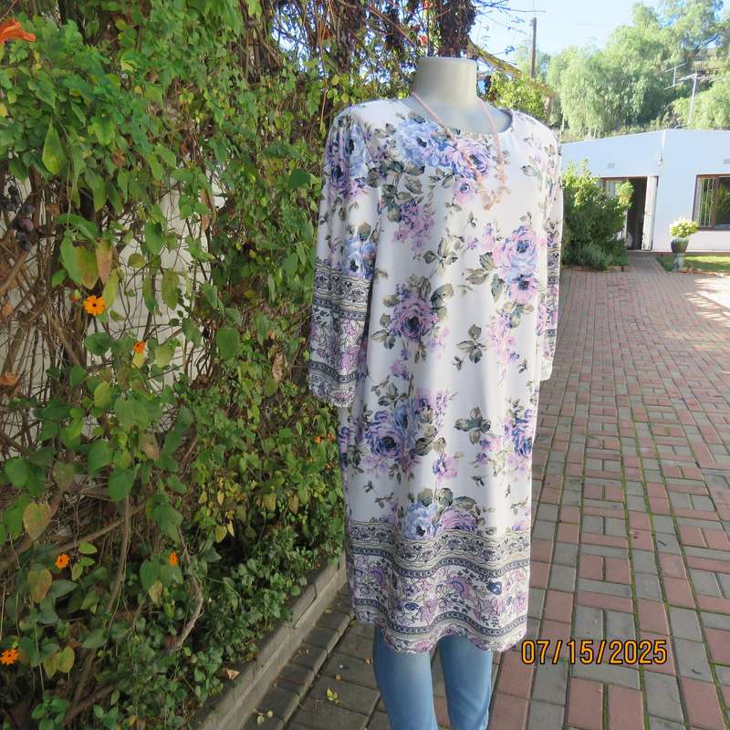 Tasteful pink-blue floral print on white background long stretch polyester top. Size 44