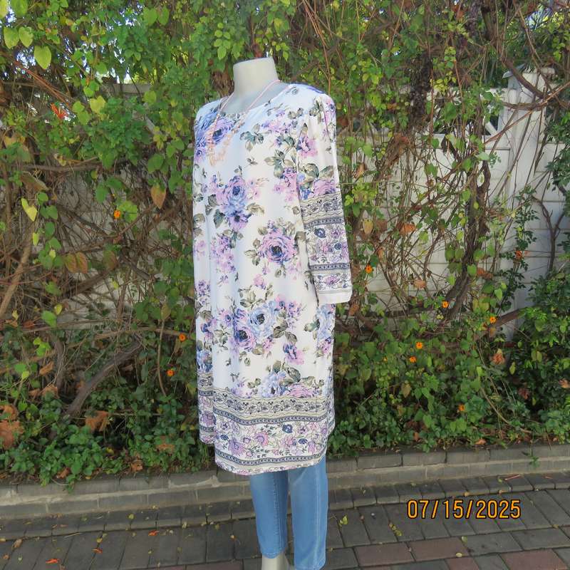 Tasteful pink-blue floral print on white background long stretch polyester top. Size 44