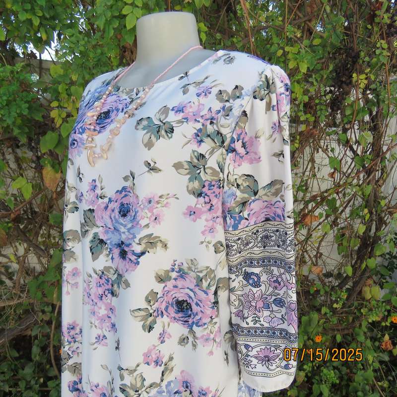 Tasteful pink-blue floral print on white background long stretch polyester top. Size 44