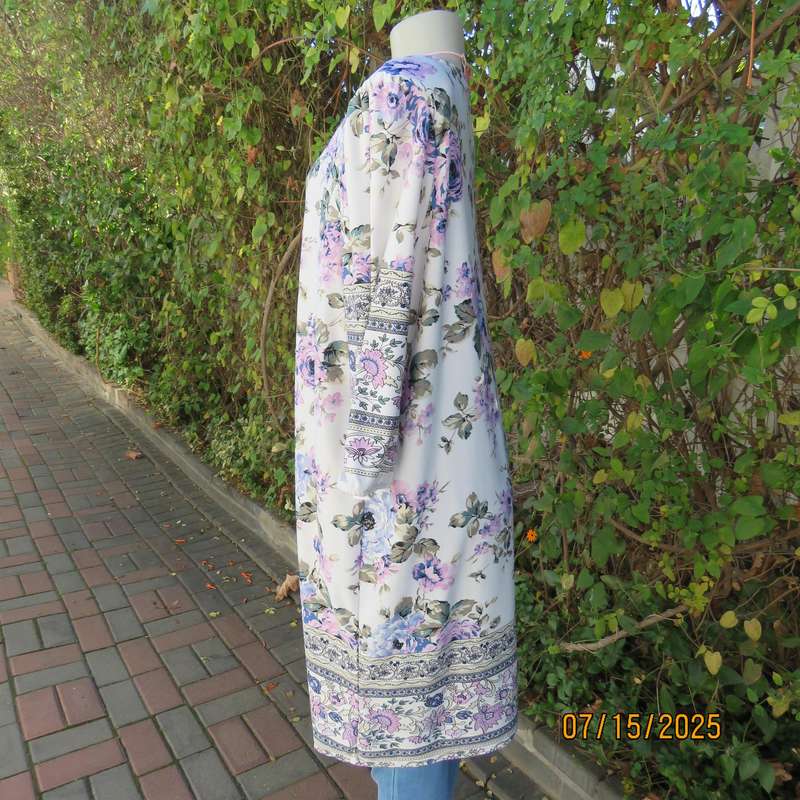 Tasteful pink-blue floral print on white background long stretch polyester top. Size 44