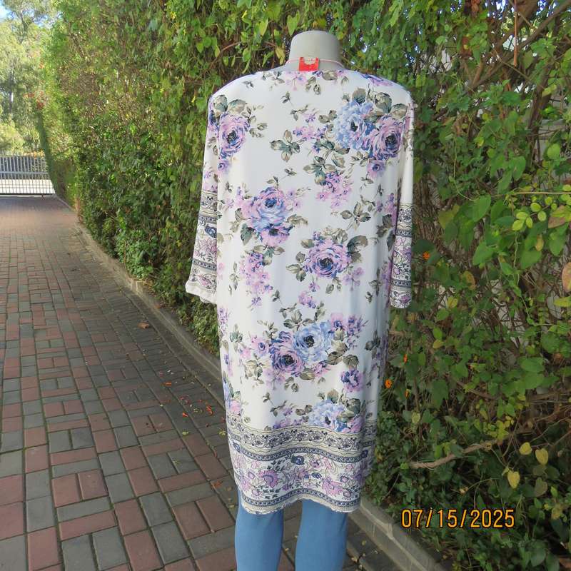 Tasteful pink-blue floral print on white background long stretch polyester top. Size 44