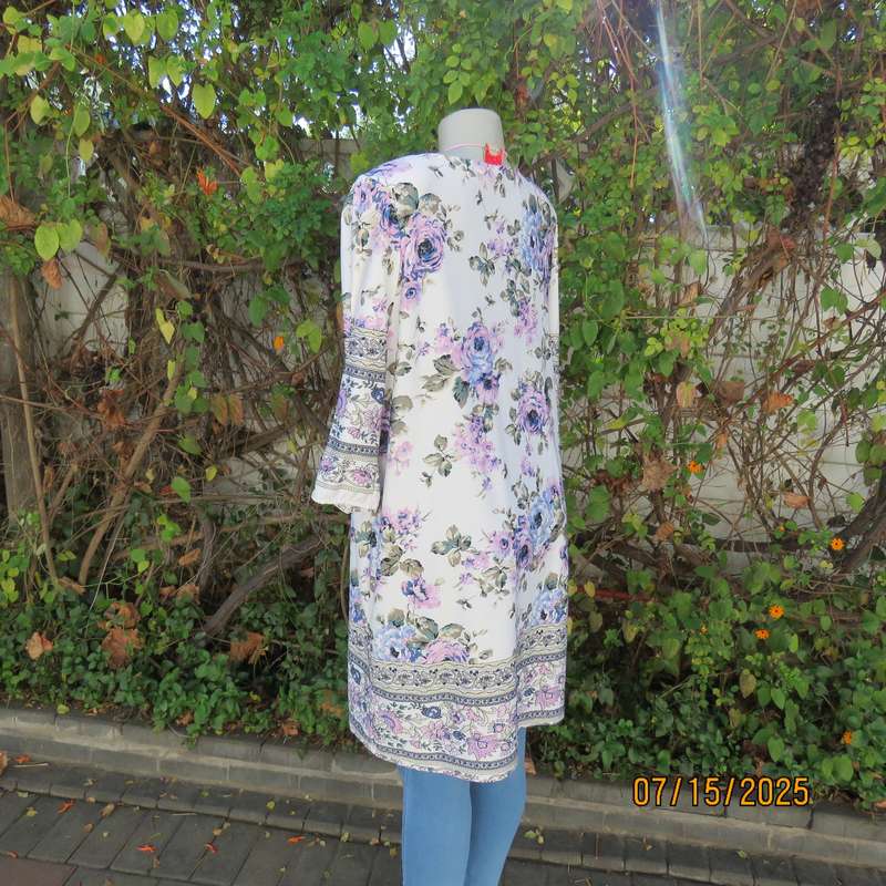 Tasteful pink-blue floral print on white background long stretch polyester top. Size 44