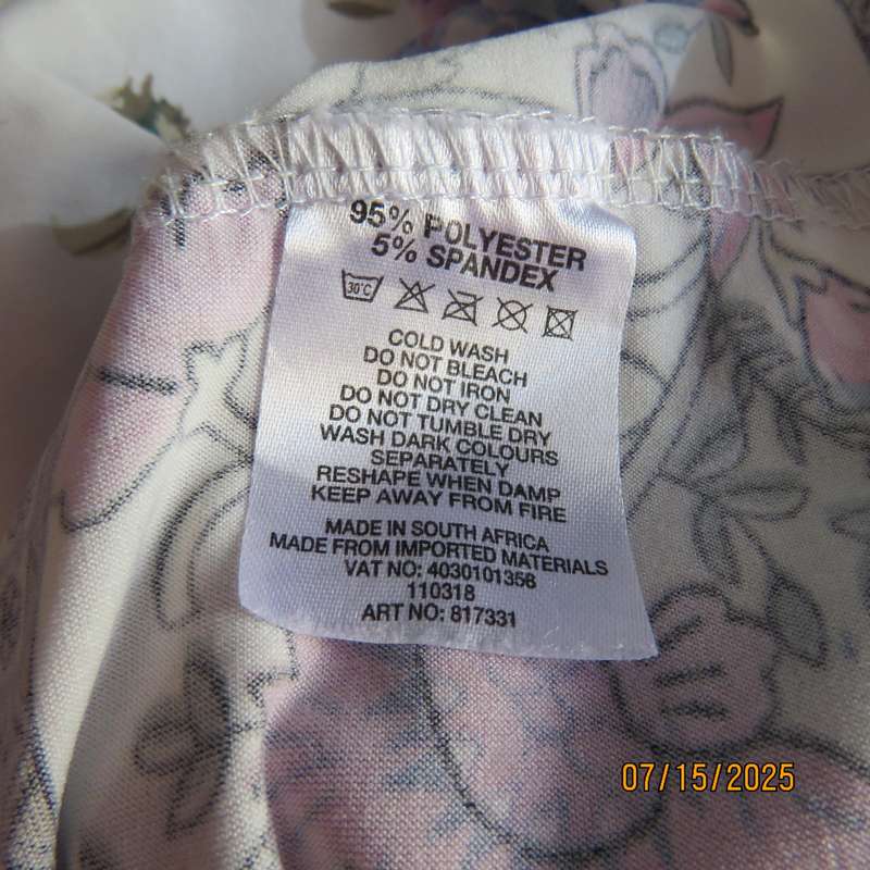Tasteful pink-blue floral print on white background long stretch polyester top. Size 44