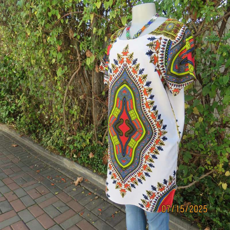 Ethnic long white polycotton short sleeve top with colourful striking print. Size 34.