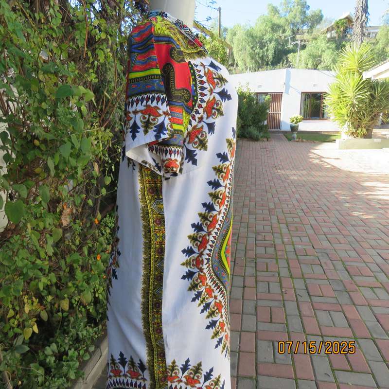 Ethnic long white polycotton short sleeve top with colourful striking print. Size 34.