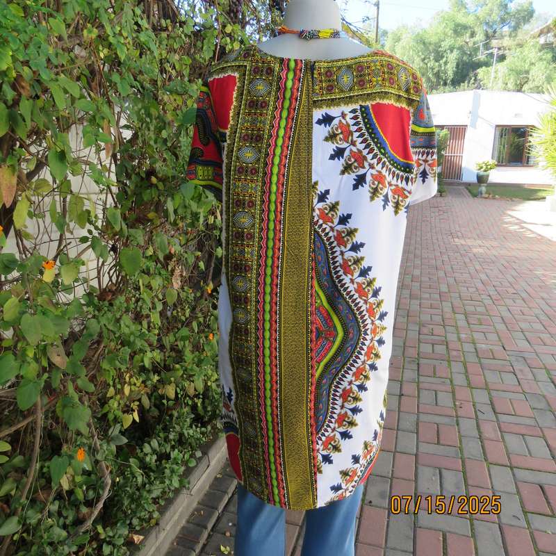 Ethnic long white polycotton short sleeve top with colourful striking print. Size 34.