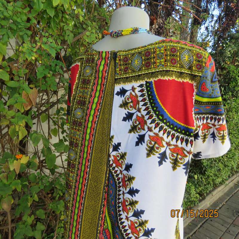 Ethnic long white polycotton short sleeve top with colourful striking print. Size 34.