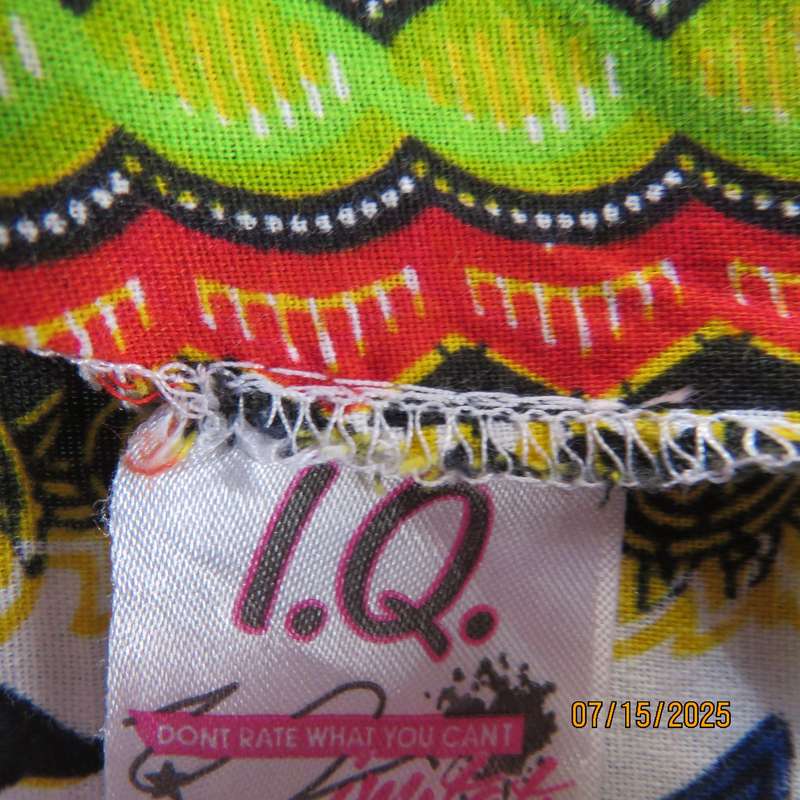 Ethnic long white polycotton short sleeve top with colourful striking print. Size 34.
