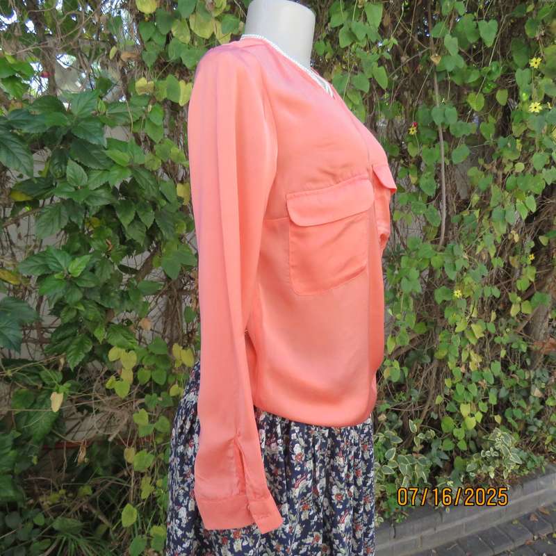 TRAFALUC  ZARA coral colour long sleeve cross over luxury polyester top. Size 35