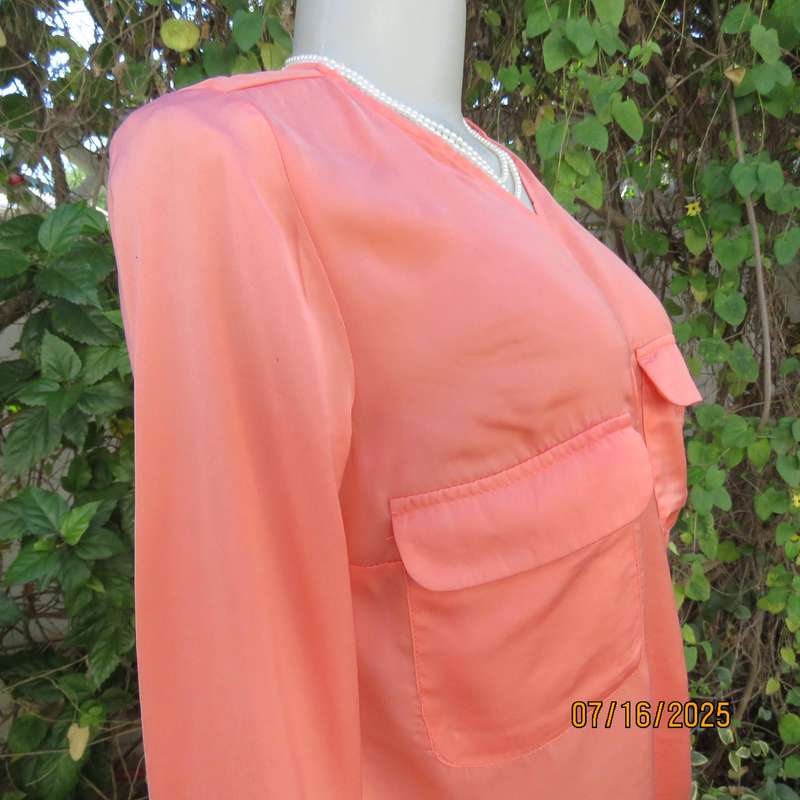 TRAFALUC  ZARA coral colour long sleeve cross over luxury polyester top. Size 35