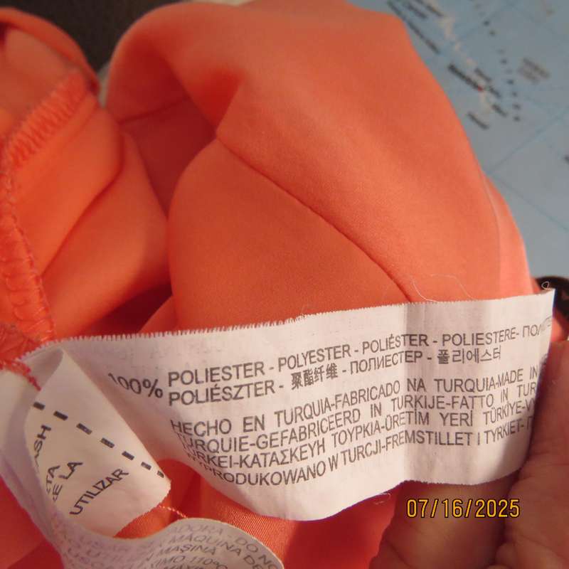 TRAFALUC  ZARA coral colour long sleeve cross over luxury polyester top. Size 35